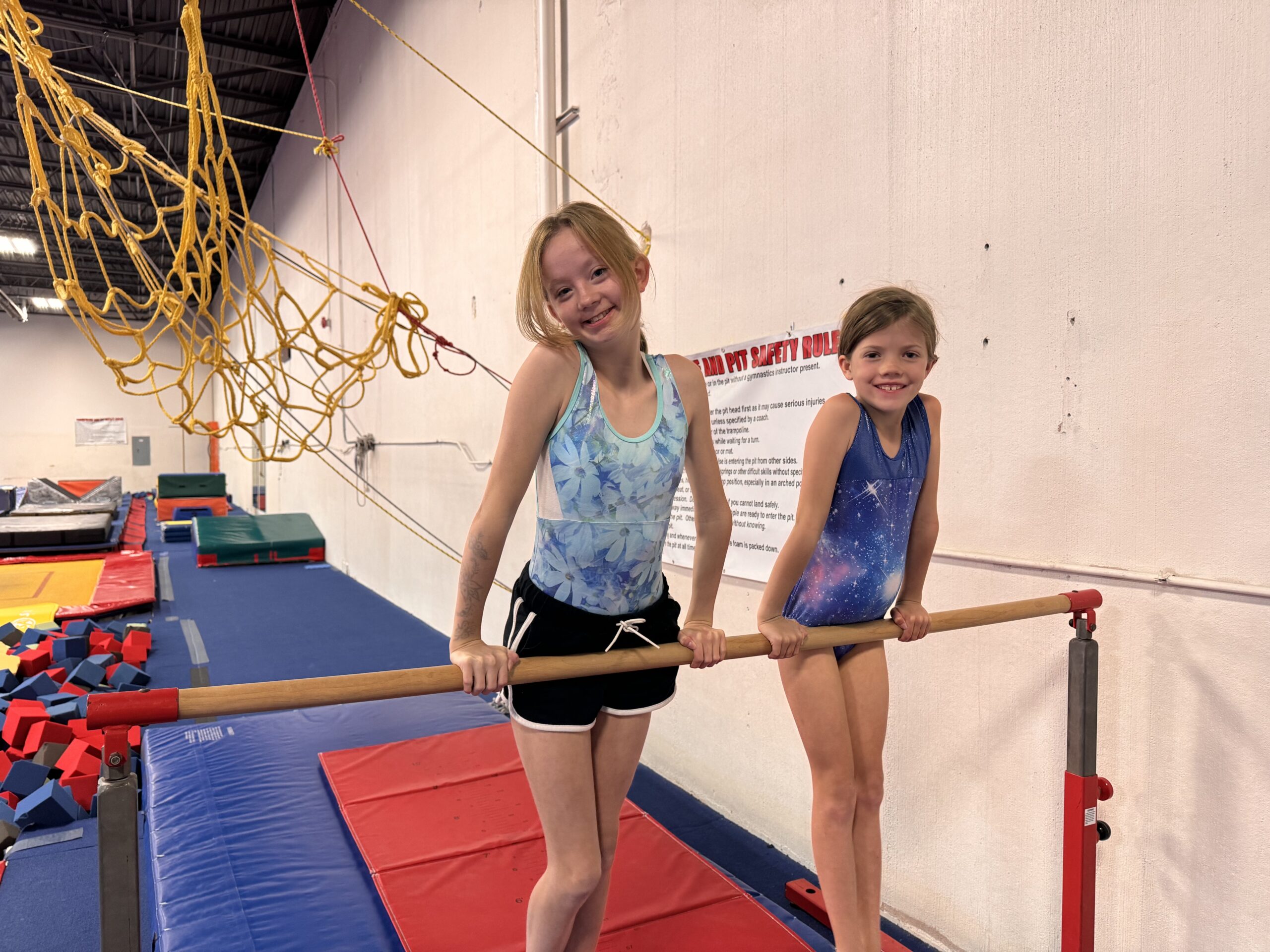 Two Girls Gymnastics Bar
