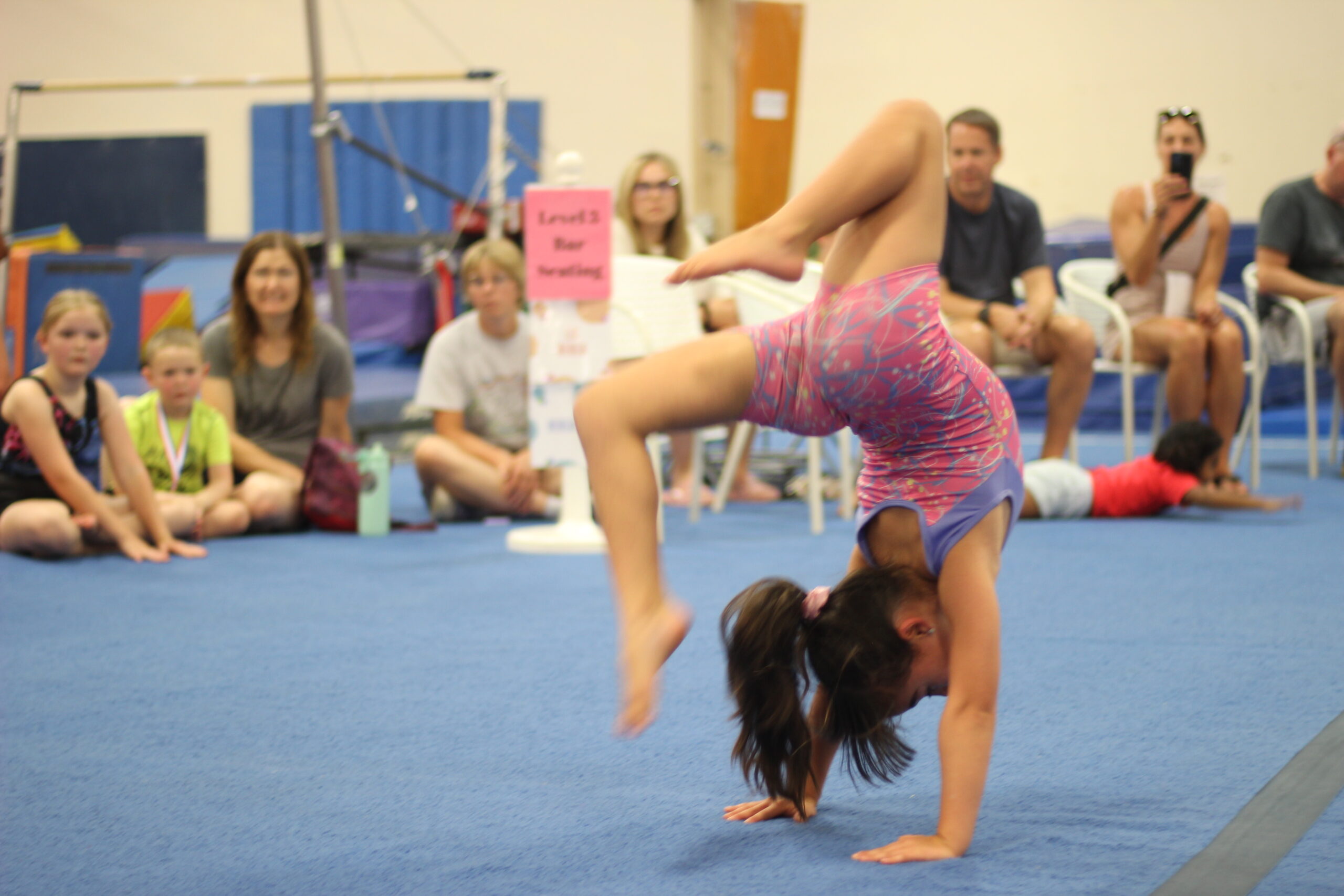 Coach with tumbling students